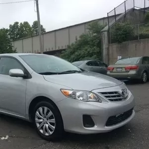 Серебряный цвет Toyota Corolla 2013 модельного, 