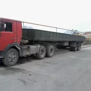 Услуги длинномера Камаз 12м. бортовой,  контейнеровоз,  шаланда. 18 тонн