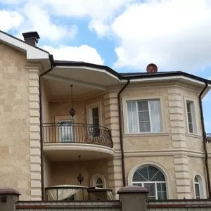 Облицовка домов травертином,  гранитом